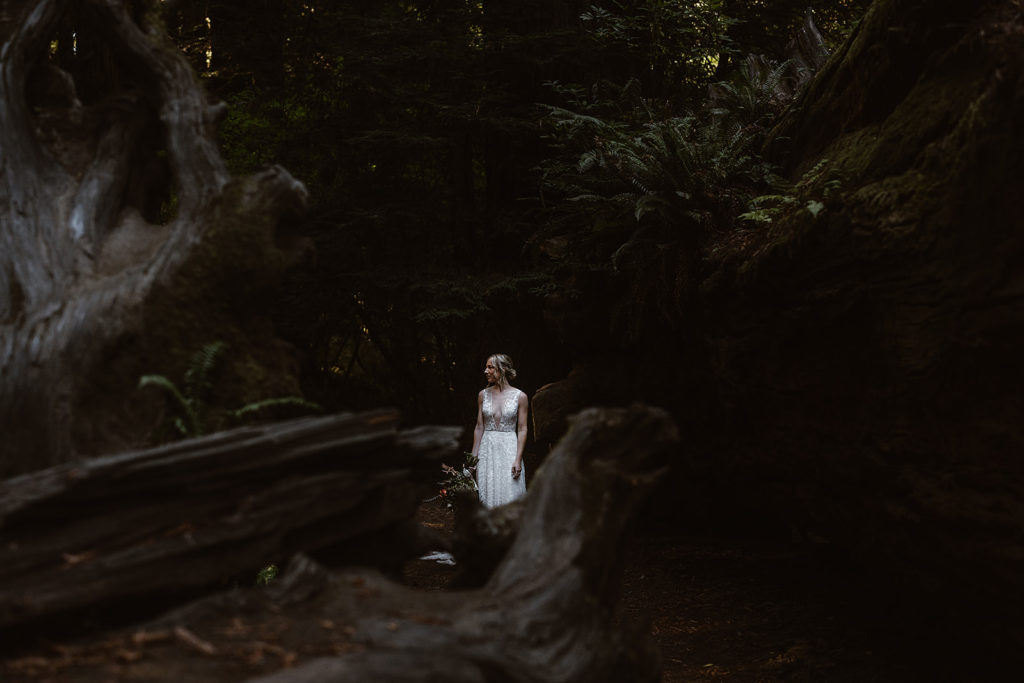 A bride walks to her first look during their Samuel H Boardman State Park Elopement