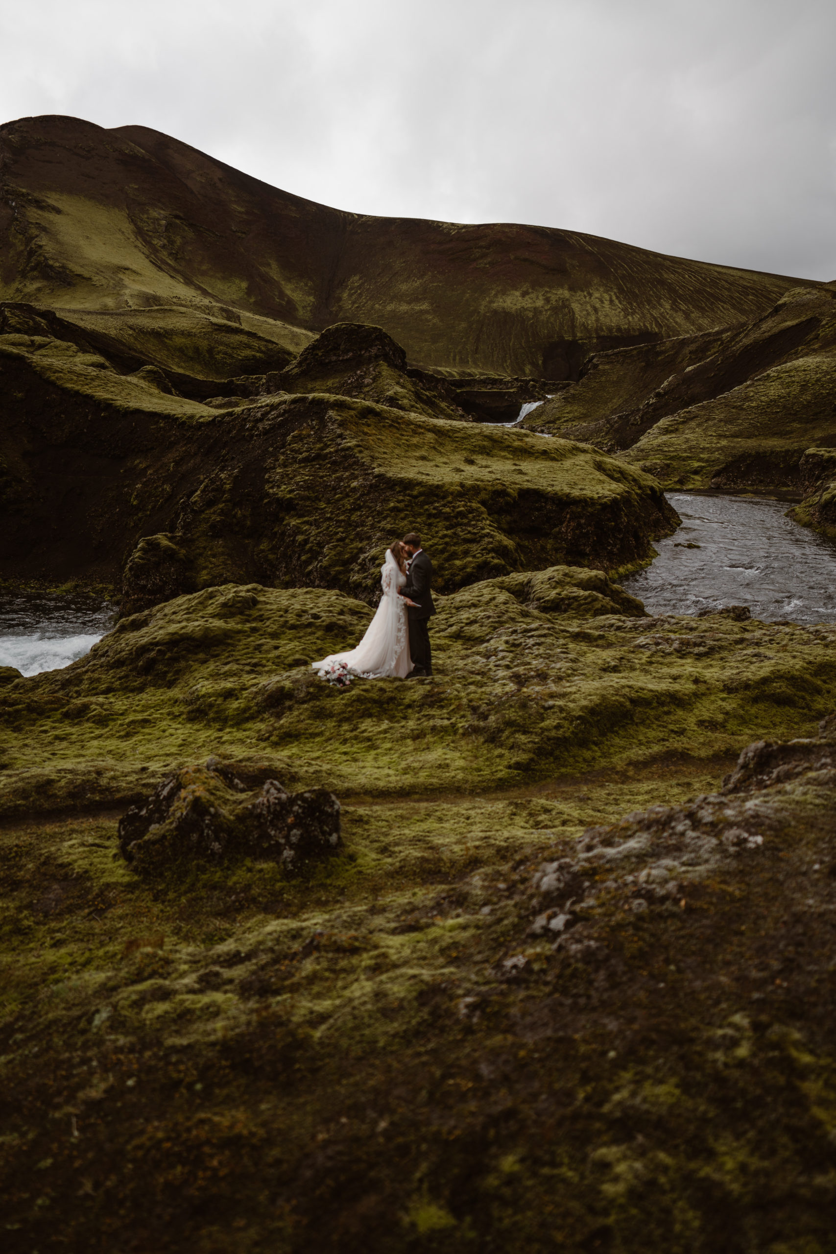 A couple kisses during their Iceland elopement