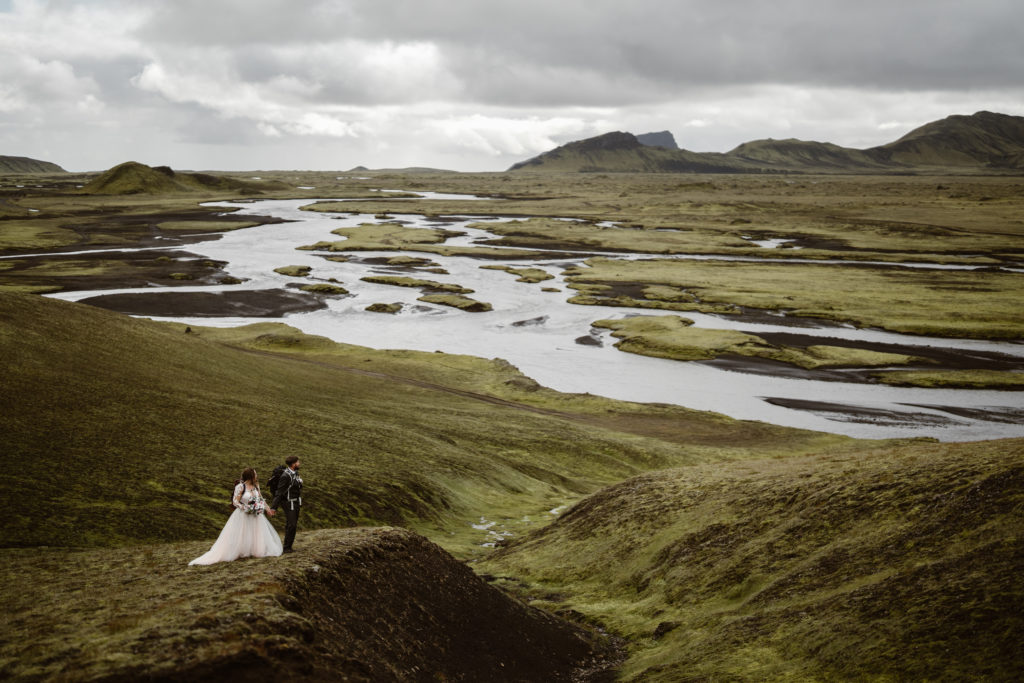 A couple walks through Iceland during their Iceland elopement