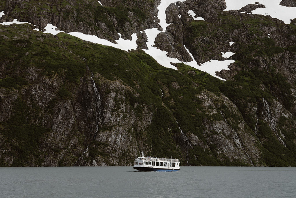 A boat sails through Alaska
