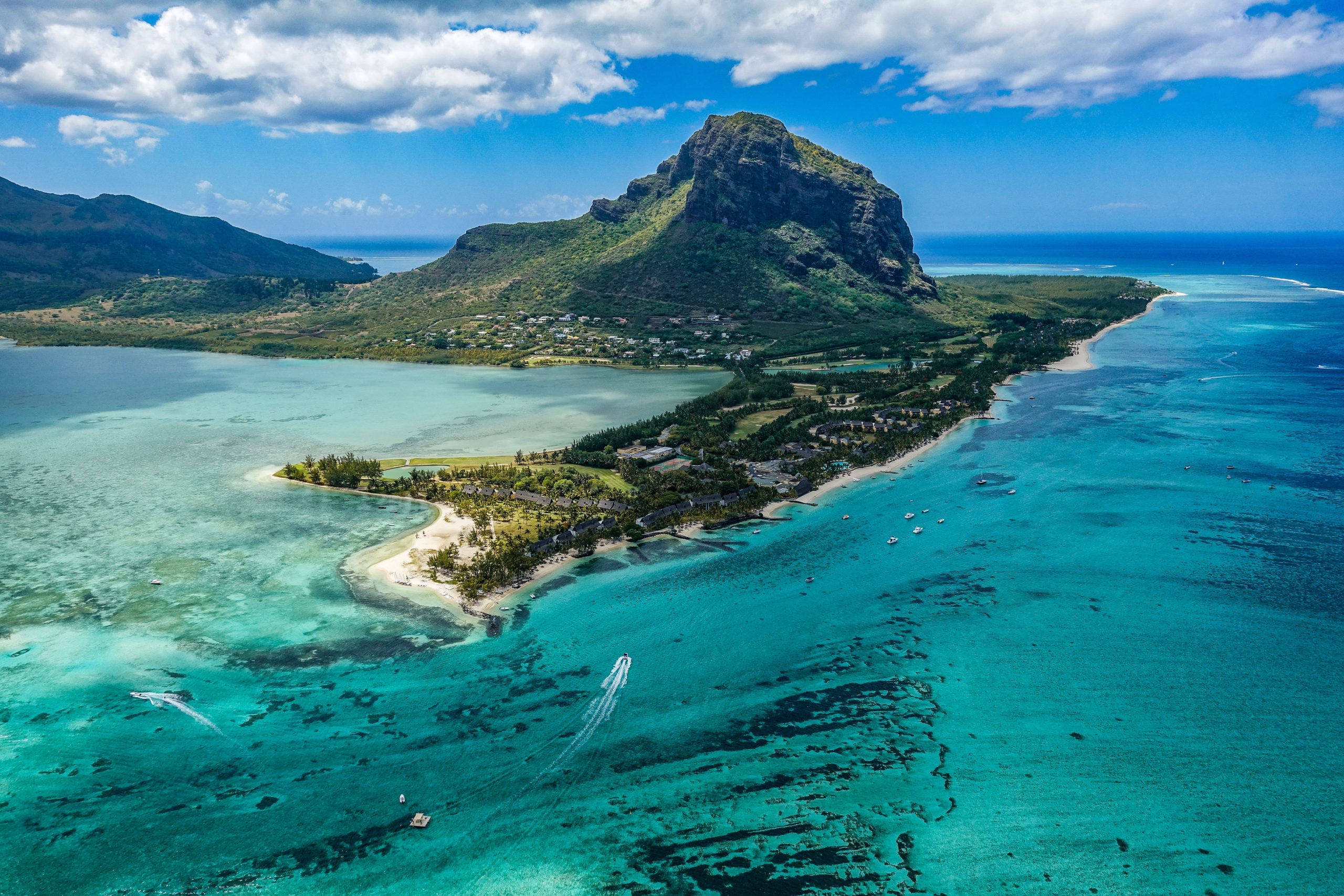 An aerial view of Mauritius Island, with bright blue water