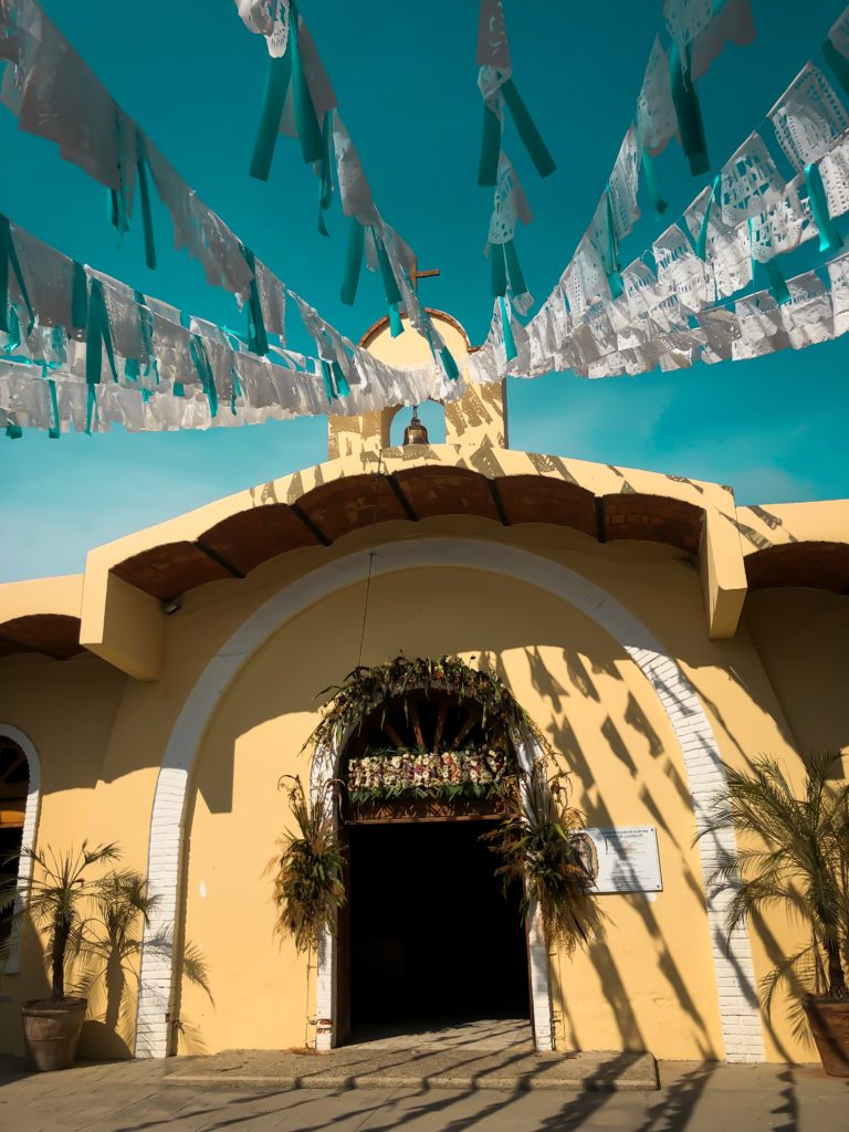 A yellow building in Mexico, as seen during a Sayulita elopement
